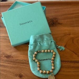 Tiffany & Co. Gold Bead Bracelet with Heart Charm